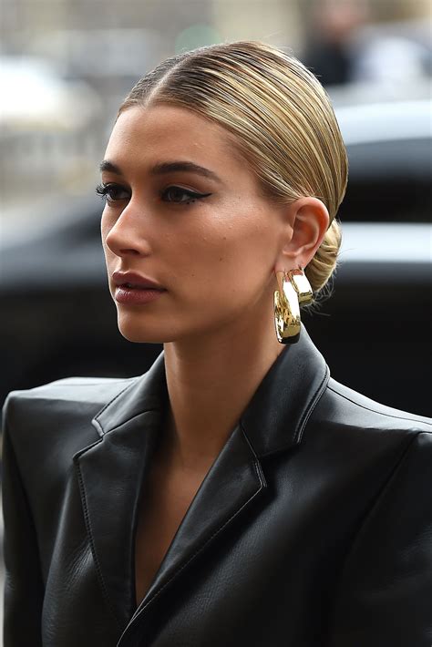 Slicked back bun; spiky bun; off-duty model bun, this ‘cool girl’ hairstyle has many aliases as it’s become the internet’s latest obsession. A favourite among the likes of Bella Hadid, Kendall Jenner and Hailey Bieber, the slicked back bun is a super easy, fuss-free hairstyle that makes you look polished and put together, even on your worst days.